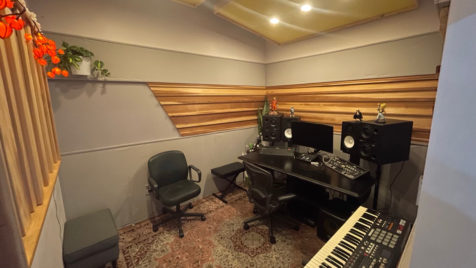 Recording studio buildout with acoustic wood slat treatment